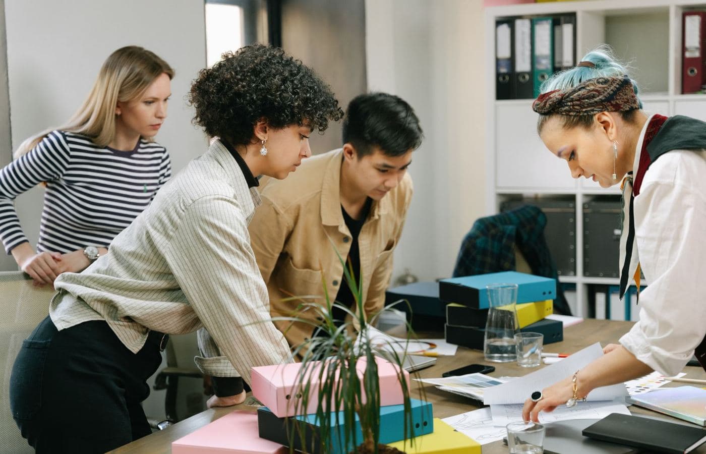 A small team working together around a table