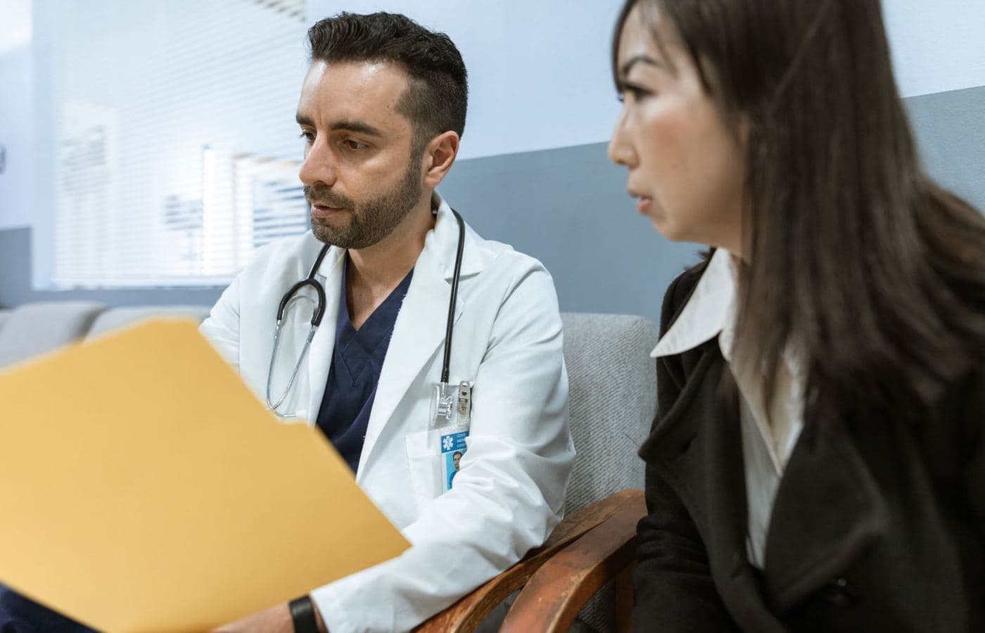 A doctor talking with a patient during an appointment