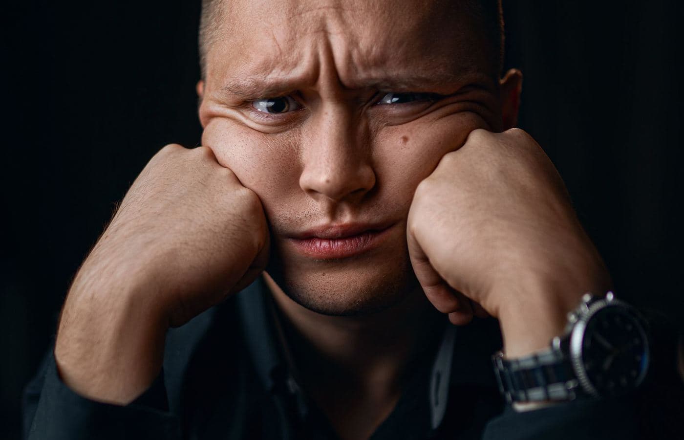 A worried man thinking through his next steps