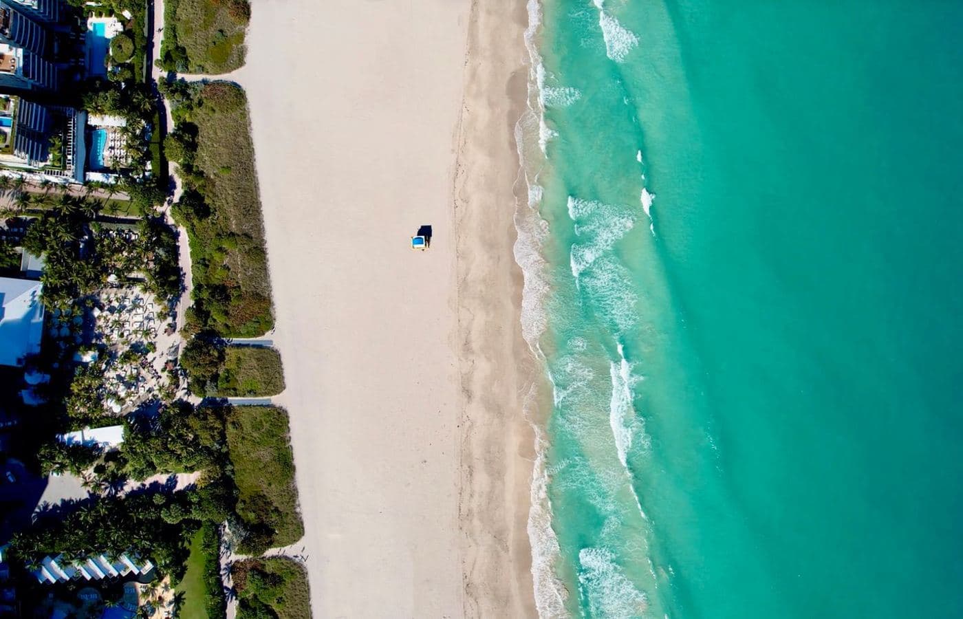 An aerial view of a coastline and beach